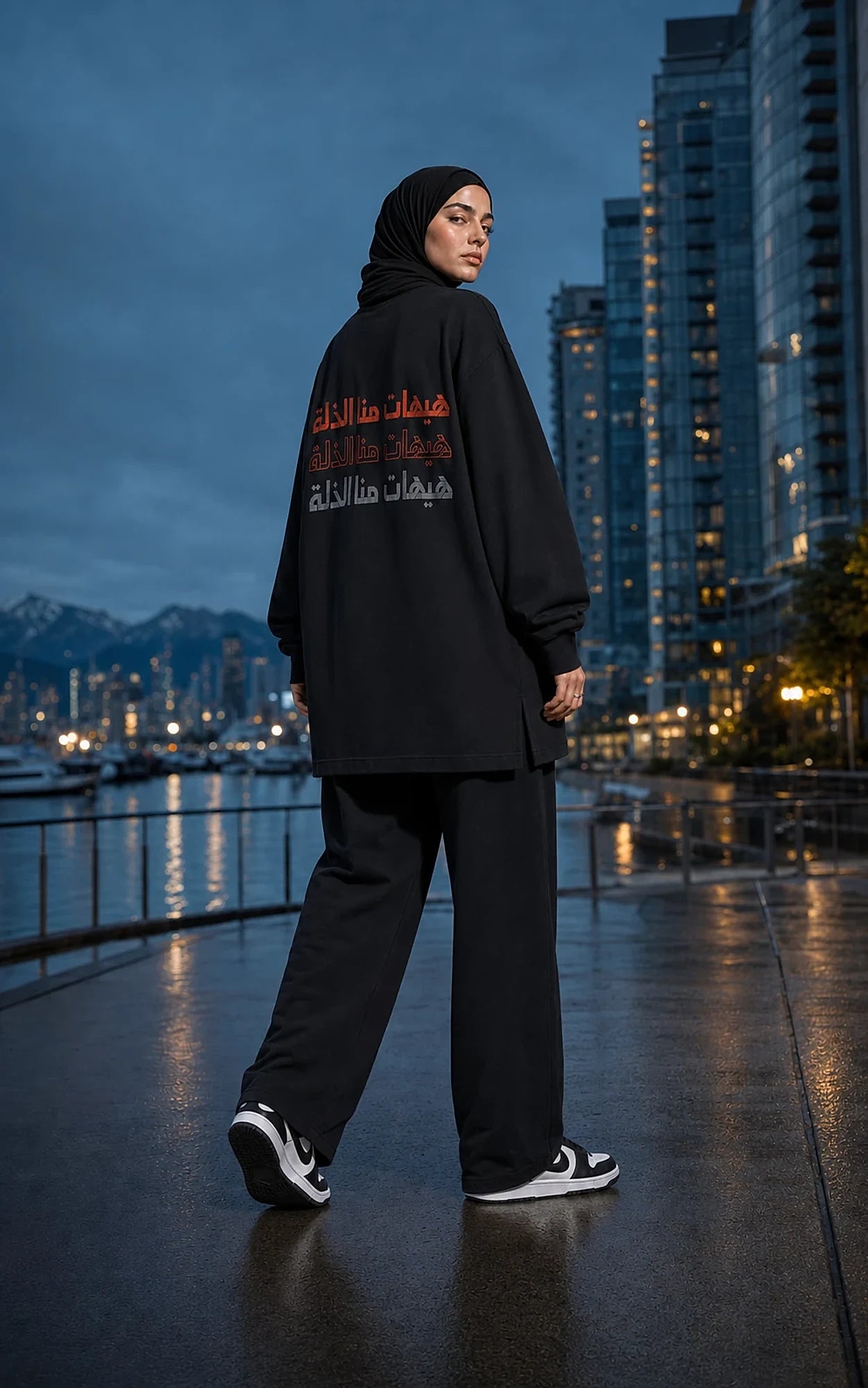 Never to Humiliation women's shirt at the waterfront