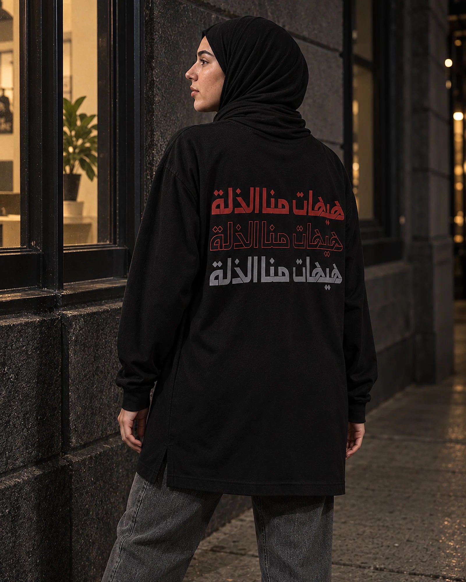 Never to Humiliation women's shirt, back print, past a black door